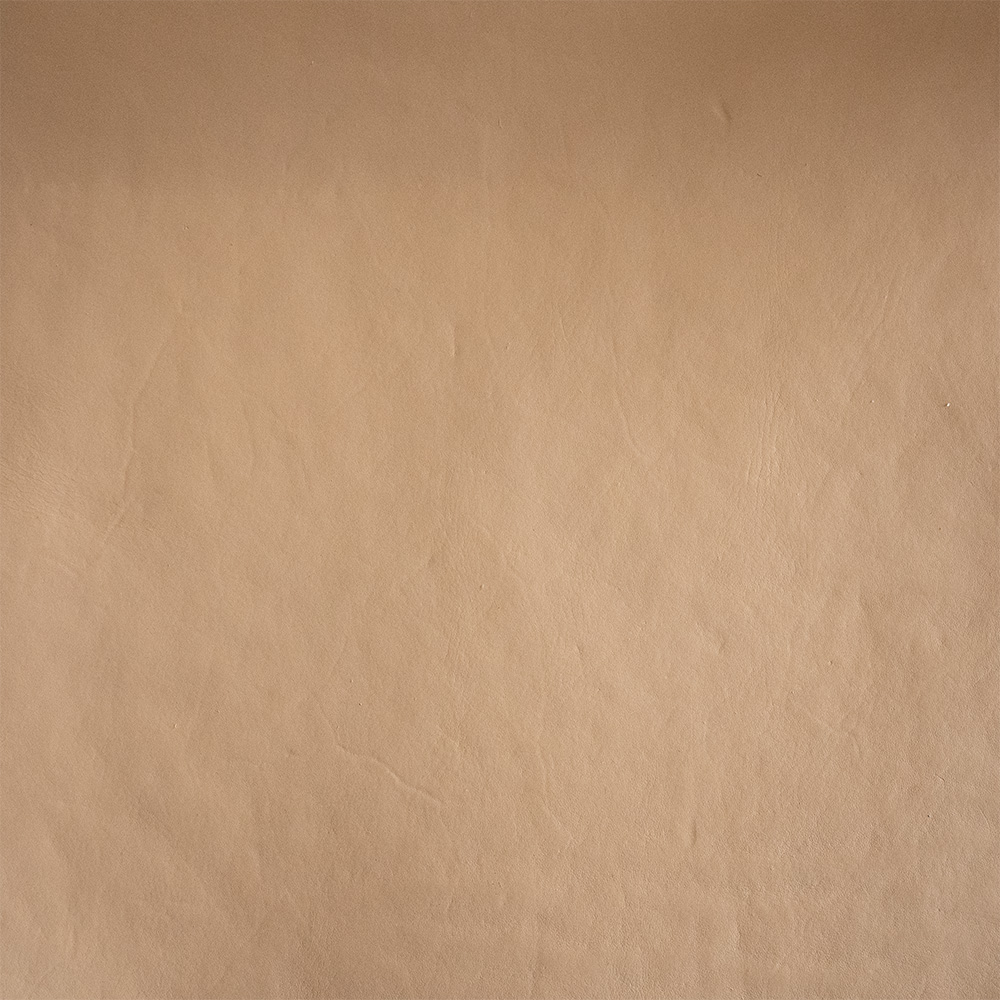 Sillón Kuna de teca y cuero trenzado beige