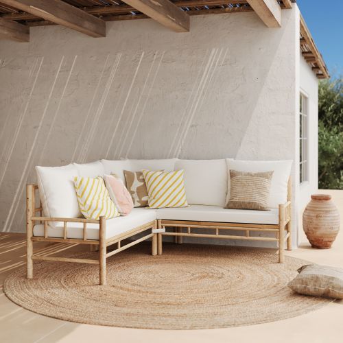 canape d angle de jardin en bambou vadella coussins blancs